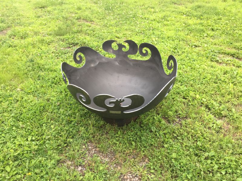 Custom fire pit with waves and phoenix design