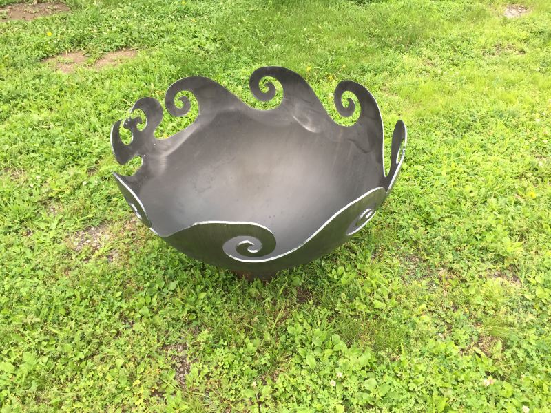 Custom fire pit with waves and phoenix design