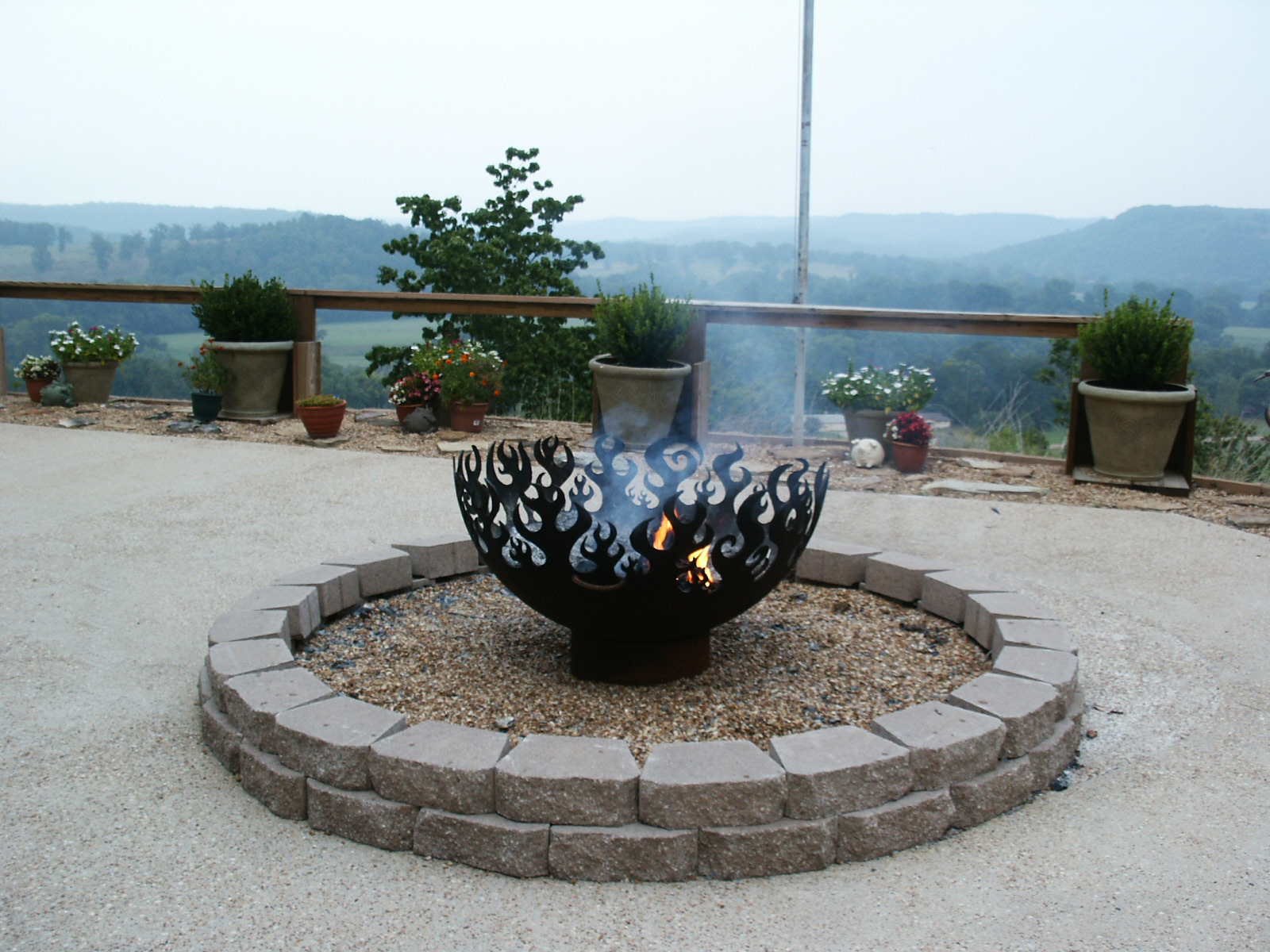 Fire Sculptural Fire Pit overlooking river in Norfolk, AR