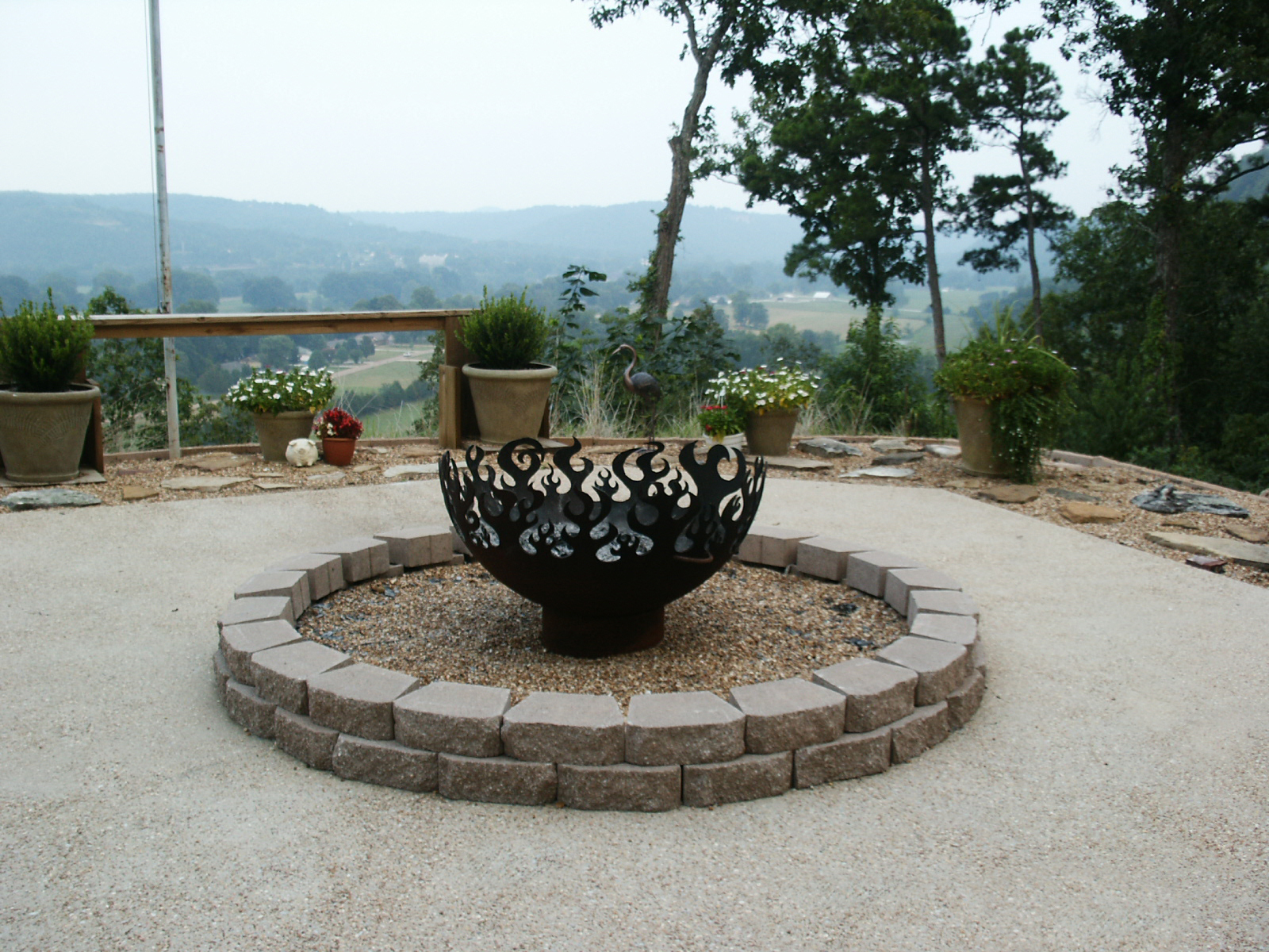 Fire Sculptural Fire Pit overlooking river in Norfolk, AR