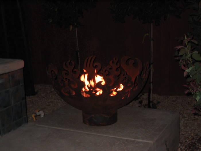 Fire Sculptural Fire Pit at night