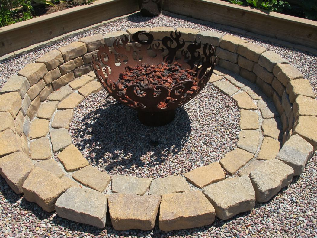 Inset limestone blocks around fire pit