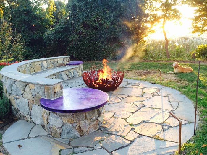 Fire Sculptural Fire Pit and stone patio