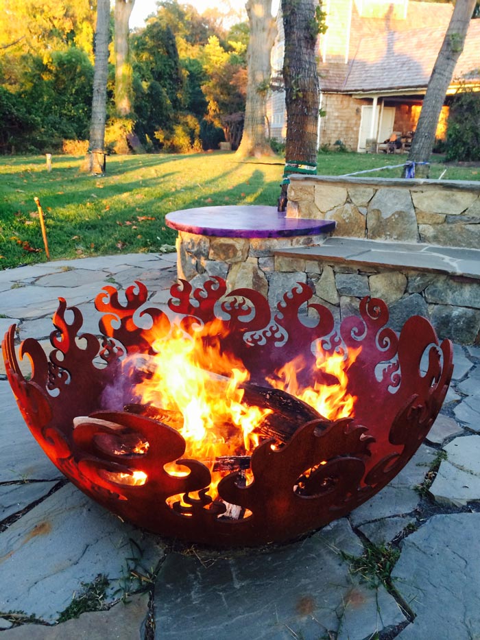 Fire Sculptural Fire Pit and stone patio