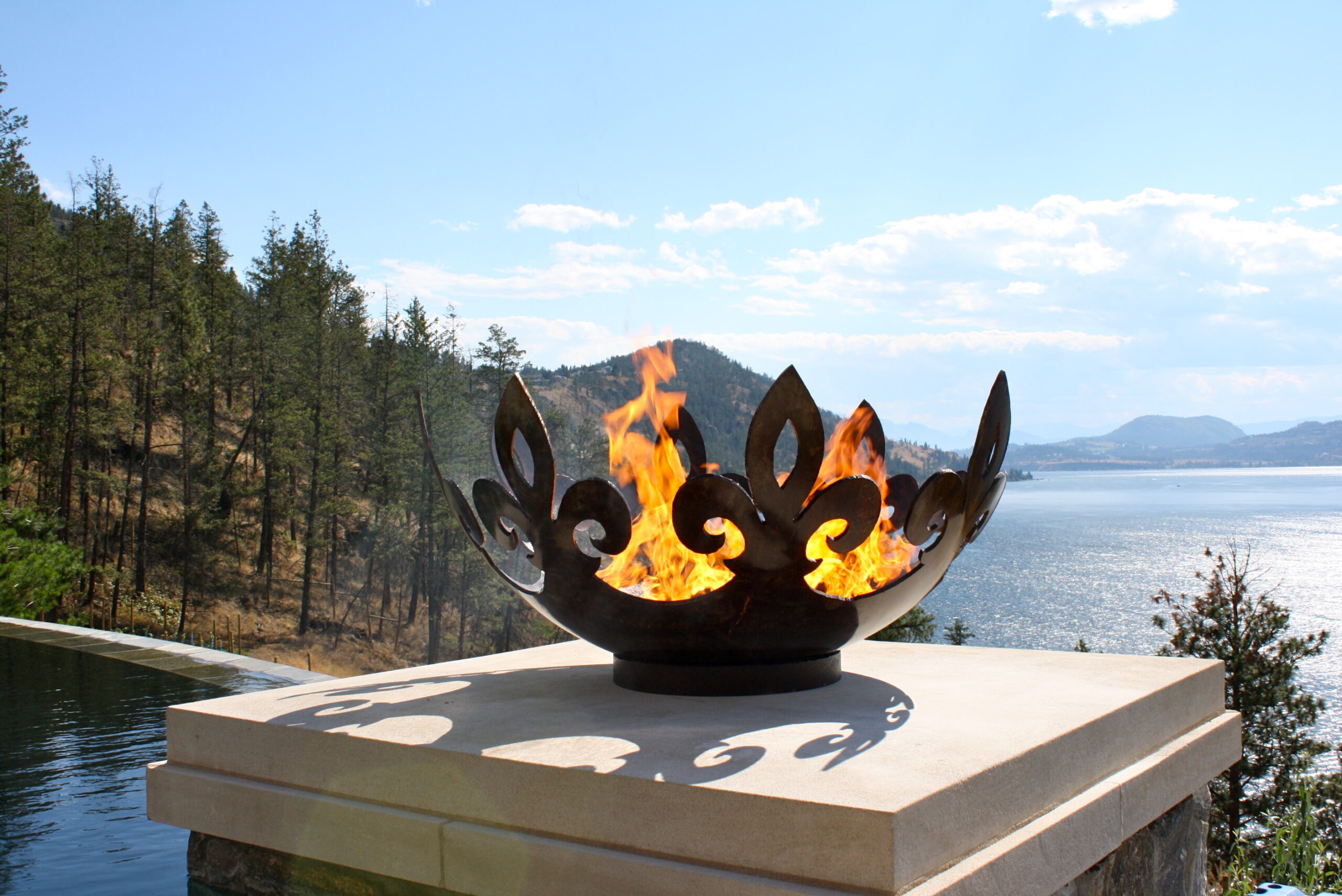 Fiery Fleur-de-lis 37 Inch Sculptural Fire Pit on Lake Okanagan Near Kelowna, BC