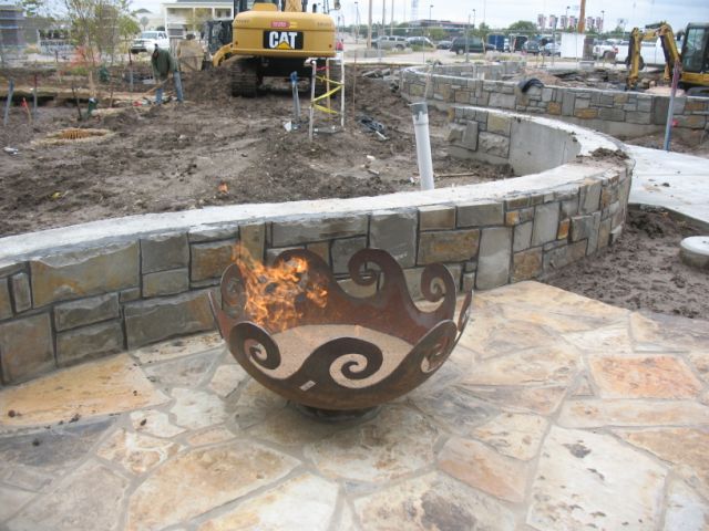 Waves Sculptural Fire Pit at WaterWalk Place in Wichita